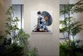 Azure Silence — Geisha of Porcelain Bloom — porcelain canvas art displayed in an office lobby garden setting